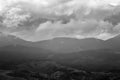 Cloudy Carpathian mountains landscape. Chornogora ridge, black and white photo.