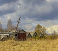 Cloudy day in early spring. Abandoned farm buildings. Russia.