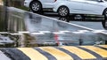 Cloudy day after heavy rain in the city. cars parked in street