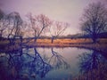 Cloudy day at the lake. water reflecting clouds Royalty Free Stock Photo