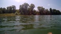 Cloudy day at the lake. water reflecting clouds Royalty Free Stock Photo