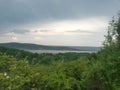 Cloudy day at the lake. water reflecting clouds Royalty Free Stock Photo