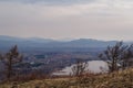 Cloudy day outside the city. Gloomy spring landscape, mountains Royalty Free Stock Photo