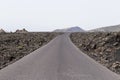 Cloudy day and road as travel background. volcanic scenery. white sky