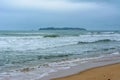 Cloudy day, sand deserted beach of the coast of Haitang Bay in South China Sea. Sanya, island Hainan, China. Nature Landscape Royalty Free Stock Photo