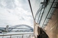 Sydney Harbor Bridge and harbor reflected in Opera House, Australia Royalty Free Stock Photo