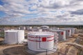 Tanks with oil for further transportation of oil through pipes at an oil refinery and oil pumping station