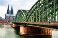 Cloudy day view of Cathedral and Hohenzollern bridge in Cologne, Germany Royalty Free Stock Photo