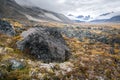 Cloudy day in the wild, remote arctic valley of Akshayuk Pass, Baffin Island, Canada. Iconic granite mountains on the