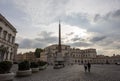 Cloudy evening and a deserted cobbled square in Rome