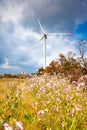 Cloudy evening landscape with two windgenerator at a coast in Jeju Island, Korea. Royalty Free Stock Photo