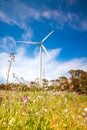 Cloudy evening landscape with two windgenerator at a coast in Jeju Island, Korea. Royalty Free Stock Photo