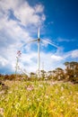 Cloudy evening landscape with two windgenerator at a coast in Jeju Island, Korea. Royalty Free Stock Photo