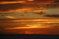 Cloudy Fiery sunset over the ocean Hawaii Royalty Free Stock Photo