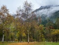 Cloudy and foggy autumn alpine mountain scene. Austrian Lienzer Dolomiten Alps