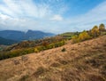 Cloudy and foggy day autumn mountains scene. Peaceful picturesque traveling, seasonal, nature and countryside beauty concept scene Royalty Free Stock Photo