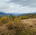 Cloudy and foggy day autumn mountains scene. Peaceful picturesque traveling, seasonal, nature and countryside beauty concept scene Royalty Free Stock Photo