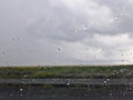 Water droplets on the car window Royalty Free Stock Photo