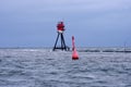 Navigation signs in the Wadden Sea near the island of Borkum Royalty Free Stock Photo