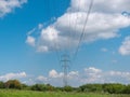 Cloudy morning sky and a high-voltage line