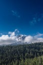 Cloudy Mount Rainier and Deep Blue Sky