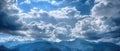 Cloudy Mountain Landscape with a Dramatic Blue Sky Royalty Free Stock Photo