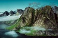 Cloudy mountaintops of fjords