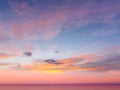 cloudy pink sinset night sky sundown reflection on sea water blue orange pink colorful nature landscape
