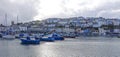 Cloudy sky Boats Brixham harbor harbour Devon England