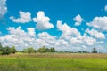 Cloudy sky with field Royalty Free Stock Photo