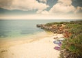 Cloudy sky over Alghero shore in vintage tone