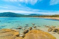 Cloudy sky over beautiful Cala Pira shore