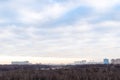 Cloudy sky over city park in autumn morning Royalty Free Stock Photo