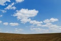 Cloudy sky over field Royalty Free Stock Photo