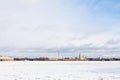 cloudy sky over frozen Neva river and Fortress