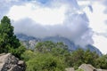 cloudy sky over mountain forest Royalty Free Stock Photo