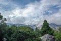 cloudy sky over mountain forest Royalty Free Stock Photo