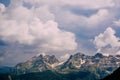 Cloudy sky over the mountain peaks. Royalty Free Stock Photo