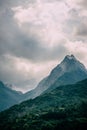 Cloudy sky over mountain peaks. Royalty Free Stock Photo