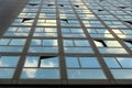 Cloudy sky reflection on glass surface of modern building Royalty Free Stock Photo