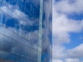 Cloudy sky reflection on the skyscraper windows Royalty Free Stock Photo