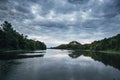 Cloudy sky on the river in the summer evening Royalty Free Stock Photo