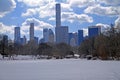 The cloudy sky, the spectacular skyscraper and the snow on Central Park Royalty Free Stock Photo