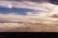 Cloudy sky with sundog Royalty Free Stock Photo