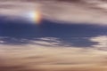Cloudy sky with sundog Royalty Free Stock Photo