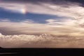 Cloudy sky with sundog Royalty Free Stock Photo