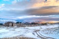 Cloudy sky at sunset over panoramic landscape of valley and mountain in winter Royalty Free Stock Photo