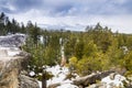 Cloudy spring day with snow covering the Sierra Mountains, Lake Tahoe in the background; Van Sickle Bi-State Park; California Royalty Free Stock Photo
