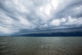 Cloudy storm in the sea before rainy. Tornado storms cloud above the sea. Royalty Free Stock Photo