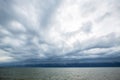 Cloudy storm in the sea before rainy. Tornado storms cloud above the sea. Royalty Free Stock Photo